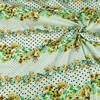 Pieni lisäkuva, jossa 1,5m pala: Trikoo digiprint kukka- ja palloraidat vaalealla mintunvihreällä