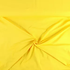 Kuvassa Keltainen - X830 Yksivärinen puuvillatrikoo - vähän elastaania