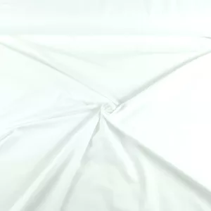 Kuvassa Kirkkaan valkoinen - X500 Yksivärinen puuvillatrikoo - vähän elastaania